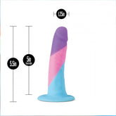 The Avant D15 Slim Petite Vision of Love Silicone Dildo by Avant features a flared base, body-safe silicone, and three tones (purple, pink, blue). It measures 5.5" total length, 5" insertable, and 1.25" width.